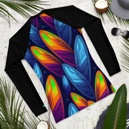 Men's rash guard with vibrant Night Sky Surfboard pattern, showcasing colorful designs against a dark background.