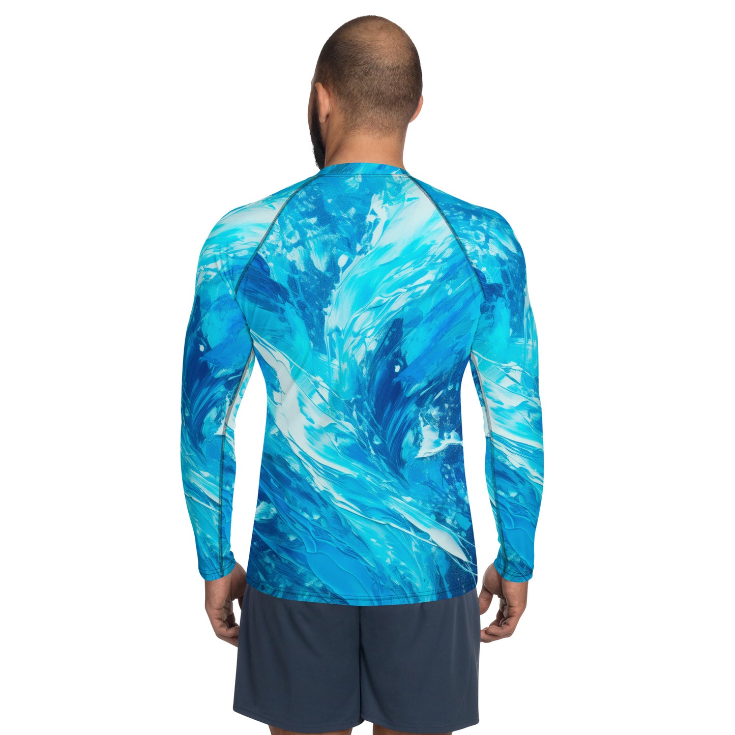 Men's rash guard with vibrant blue wave pattern, perfect for sun protection and surf style. UPF 50+ for ultimate safety.