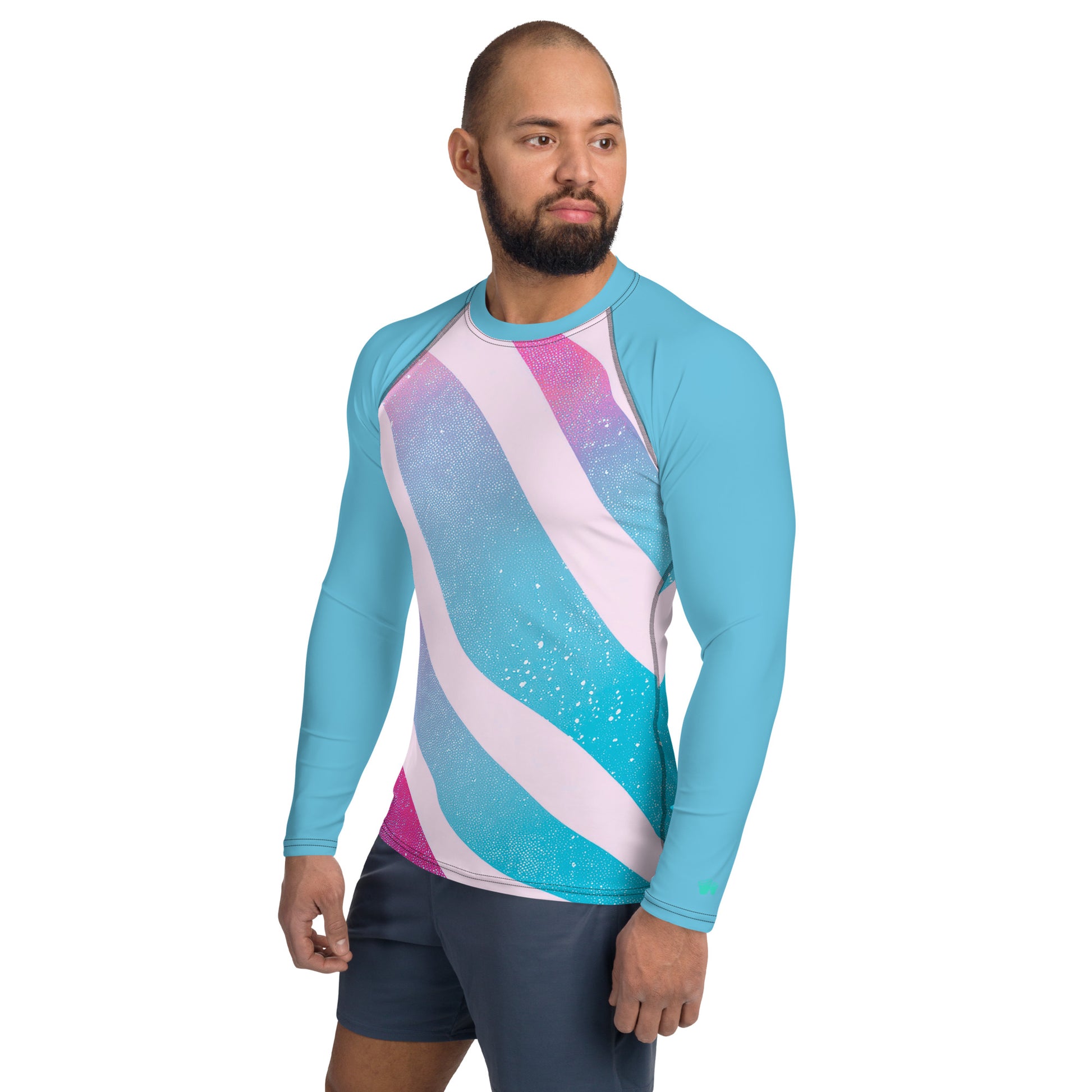 Men's rash guard with colorful wave design, showcasing UPF 50+ sun protection, perfect for surfing adventures.