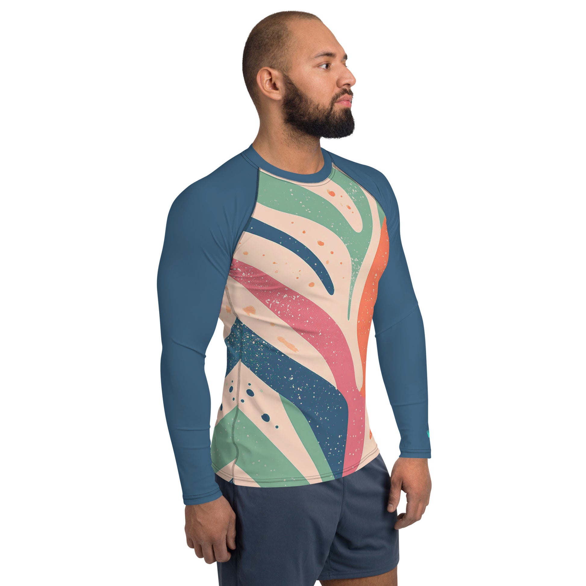 Men's rash guard in coral abstract design, UPF 50+, showcasing comfort and style for outdoor activities.